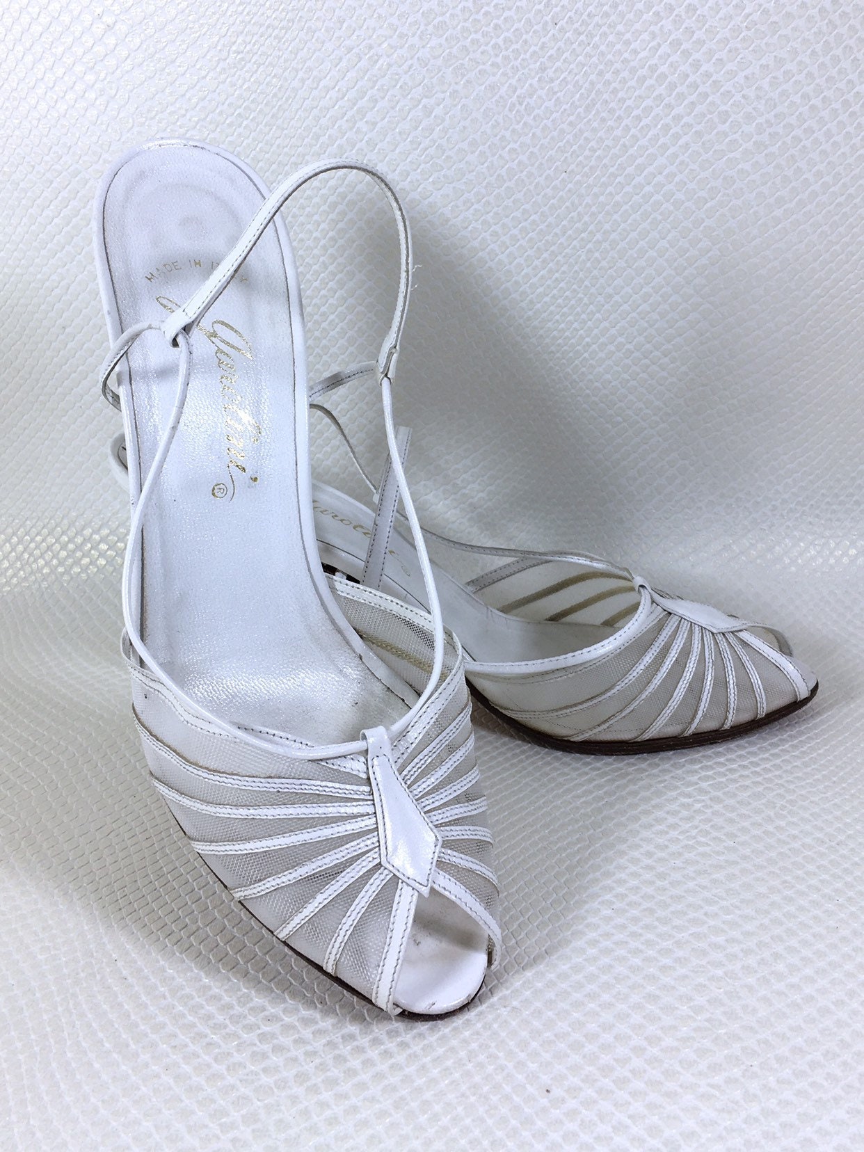 white leather stilettos