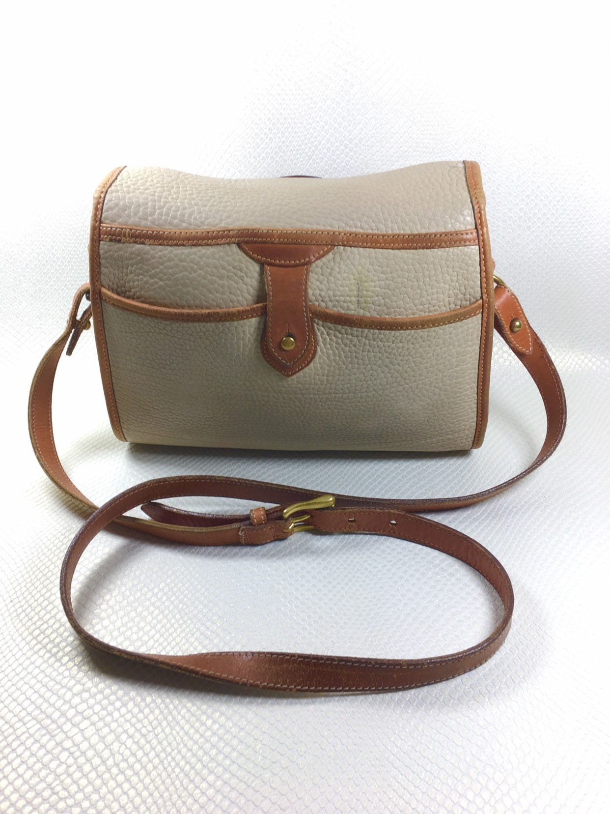 Buy the Vintage Dooney & Bourke All-Weather Leather Speedy Handbag Satchel  in Bone White/British Tan