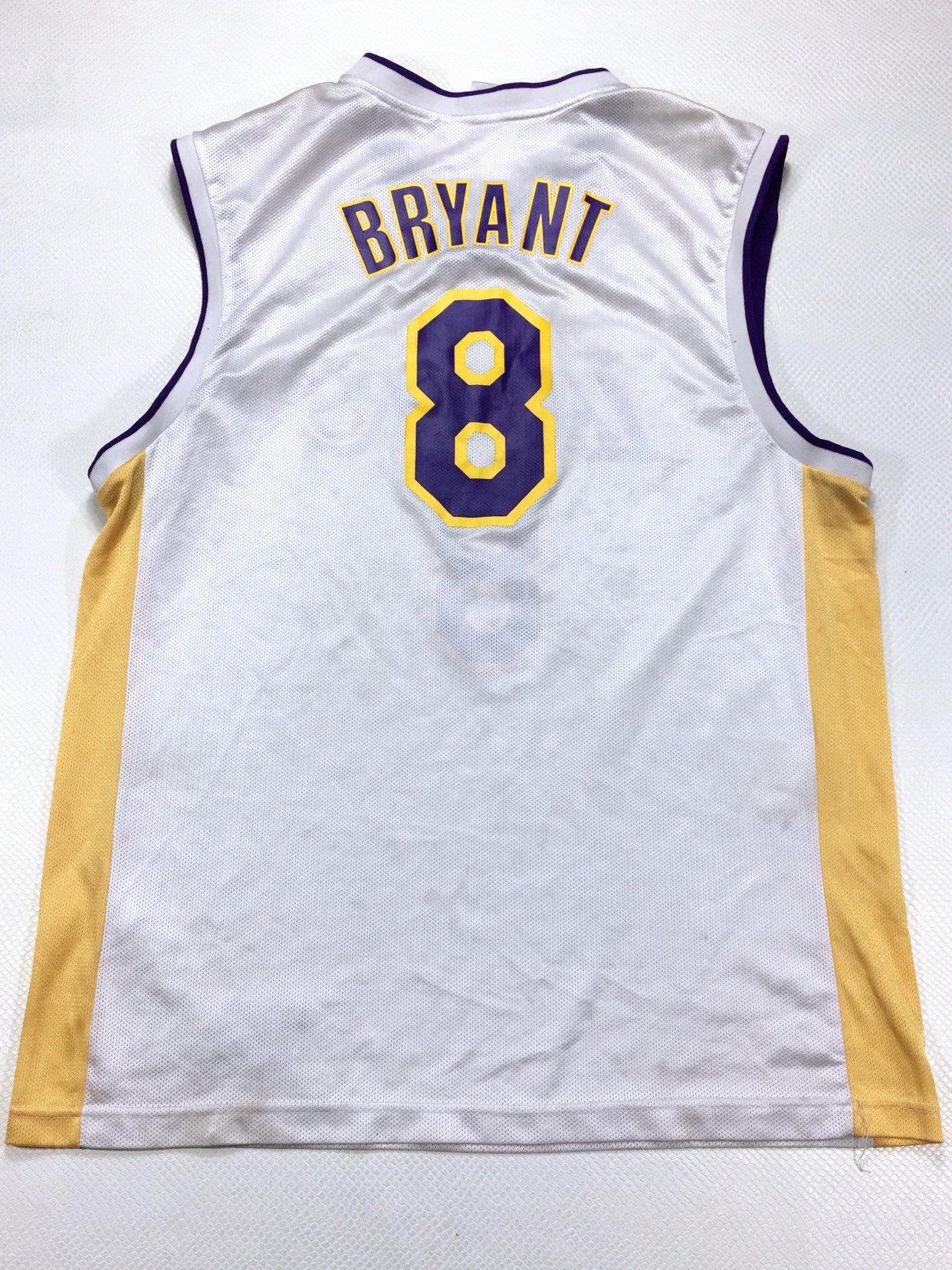 white and purple lakers jersey