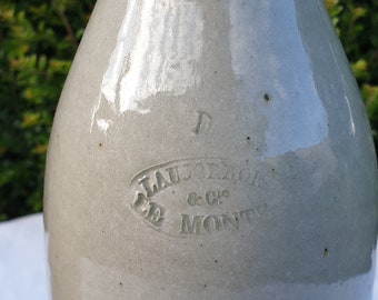 old gray sandstone bottle