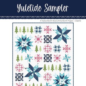May include: A quilt pattern featuring a wintery design with a variety of blue, green, pink, and white fabrics. The pattern is called "Yuletide Sampler" and is a twelve-month block-of-the-month project. The finished quilt measures 80 inches by 92 inches.