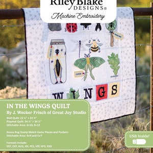 May include: A white quilt with a variety of colorful embroidered insects, including a ladybug, a bee, a cricket, and a moth. The quilt is hanging on a fence and has the words "In the Wings Quilt" and "By J. Wecker Frisch of Great Joy Studio" printed on a green background.