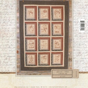 May include: A quilt pattern featuring a winter wonderland theme with a variety of redwork embroidery designs. The pattern includes images of snowmen, boots, candy canes, and a stocking. The pattern is titled "Redwork Winter Wonderland" and measures 35 inches by 38 inches.