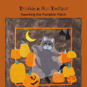 May include: A Halloween-themed artwork featuring a gray cat in a ghost costume surrounded by orange pumpkins and a yellow crescent moon. The text "Trouble & Boo Designs" and "Haunting the Pumpkin Patch" are displayed at the top.
