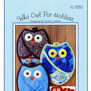 May include: A set of four owl-shaped pot holders. Two are blue with white and green accents, one is brown with gold accents, and two are red. The pot holders are designed by Vernell Lockner and are part of Susie C Shore Designs.