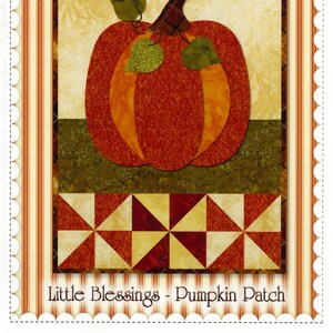 May include: A quilt pattern featuring a pumpkin with green leaves and a patchwork design. The pattern is titled "Little Blessings - Pumpkin Patch" and is from Shabby S Fabrics.