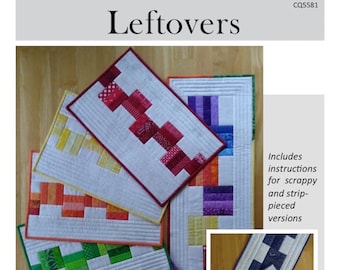 May include: A quilting pattern called "Leftovers" for a table runner and six placemats. The pattern includes instructions for scrappy and strip-pieced versions. The table runner measures 11 1/2 inches by 41 1/2 inches and the placemats measure 12 inches by 18 1/2 inches.