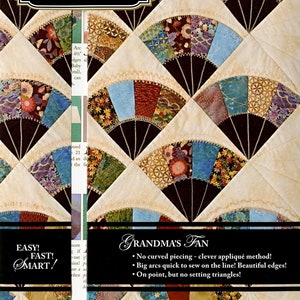 May include: Quiltsmart Grandma's Fan quilt pattern featuring a fan design with a cream background and colorful fabric pieces. The pattern is easy, fast, and smart to make.  No curved piecing, clever applique method! Big arcs quick to sew on the line! Beautiful edges! On point, but no setting triangles!
