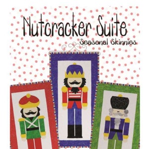 May include: A colorful image featuring three decorative panels with nutcracker designs. Each panel showcases a different nutcracker figure in vibrant colors, set against a white background. The text "Nutcracker Suite" and "Seasonal Skinnies" is displayed at the top.