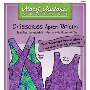 May include: A sewing pattern for a reversible crisscross apron with a purple and green floral print. The pattern includes instructions for making the apron with no ties or strings. The text on the pattern reads "Most Requested Apron Style - now with size adjustments".