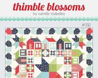 May include: A quilt pattern called "Summerville" from the "thimble blossoms" collection by Camille Roskelley. The pattern features a colorful patchwork design with houses, stars, and geometric shapes. The quilt pattern is labeled as #192 and is part of the "Sweet & Simple" line, which uses no templates or Y-seams.