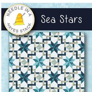 May include: Sea Stars quilt pattern by Needle in a Hayes Stack. The pattern features a white background with blue and beige star shapes. The quilt is 67 1/2 inches by 81 inches.  NH2207 Hoffman California International Fabrics.