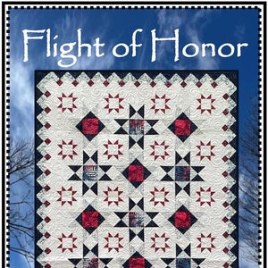 May include: A quilt pattern called "Flight of Honor" by Whirligig Designs. The quilt is made with red, white, and blue fabric and features a star pattern. The quilt is displayed against a blue sky with white clouds.