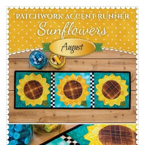 May include: A patchwork table runner featuring a sunflower design with a turquoise background and black and white checkered accents. The runner is titled "Patchwork Accent Runner Sunflowers August" and is from Shabby Fabrics.