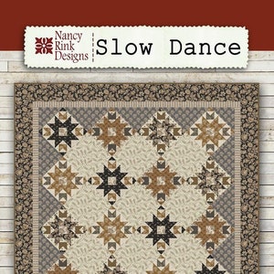 May include: A quilt pattern called "Slow Dance" by Nancy Rink Designs. The pattern uses fabrics from the Paper Petals collection by Nancy Rink for Marcus Fabrics. The finished quilt size is 84 inches by 101 inches.