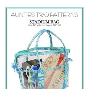 May include: Clear vinyl stadium bag with a turquoise zipper and handles. The bag is 12 inches wide, 6 inches deep, and 10 1/2 inches tall. The bag is filled with items such as a water bottle, glasses, and a ball. The bag is made from 16, 12, 10, or 8 gauge vinyl. Six inside pockets keep everything organized. Two inside middle pockets are large enough for a phone or iPad mini.  Aunties Two Mebane, NC e-mail: info@auntiestwo.com Copyright 2024 Pattern Number AT 673