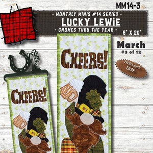 May include: A digital pattern for a quilted wall hanging featuring a gnome holding a beer mug and wearing a green hat and plaid pants. The gnome is standing on a green shamrock and the text "Cheers!" is above the gnome. The pattern is titled "March" and is part of the "Lucky Lewie" series. The pattern is 6 inches wide by 20 inches long.