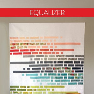 May include: A quilt pattern called "Equalizer" by Color and Quilt, designed by Robin Pickens. The quilt features a white background with horizontal rows of colorful fabric squares in shades of red, gray, blue, and green.