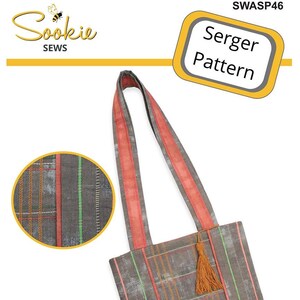 May include: A gray and orange plaid tote bag with a tassel. The bag has a red and gray striped strap. The bag is called "Tabitha Tote" and is a serger pattern.