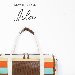 May include: A brown, white, orange, and turquoise retro duffle bag with a leather bottom. The bag has a zipper closure and a long strap. The text "Isla" is written in cursive above the bag. The text "Sew in Style" is written above the text "Isla". The text "Sallie Tomato" is written below the bag. The text "Your source for quality sewing patterns & supplies" is written below the text "Sallie Tomato".