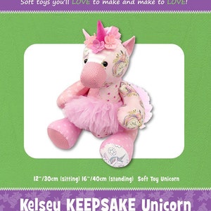 May include: Pink and white unicorn soft toy with a pink tutu and a flower crown. The toy is 12 inches tall when sitting and 16 inches tall when standing. The pattern includes instructions for making the toy. The pattern is called "Kelsey Keepsake Unicorn".