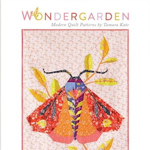 May include: A colorful quilt pattern featuring a moth with orange, red, yellow, and purple wings. The moth is surrounded by green leaves and a pink background with a white polka dot pattern. The quilt pattern is titled "The Moth" and is part of the "Wondergarden" collection of modern quilt patterns by Tamara Kate. The quote "In all things of nature there is something of the marvelous" ~ Aristotle is also included.