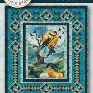 May include: A quilt with a central image of a tree, crows, and pumpkins under a full moon. The quilt is 64" x 72" and features a teal and geometric border. The words "Harvest Moon" are at the top.