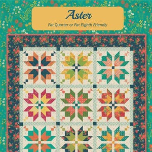 May include: A colorful quilt with a floral border and a repeating star pattern. The quilt features a variety of colors, including orange, green, yellow, and red. The text "Aster" and "Anka's Treasures" are visible.