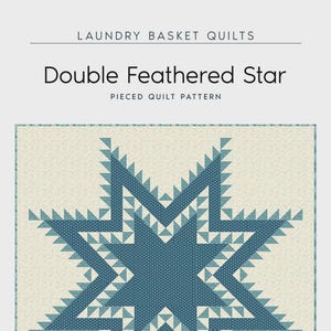 May include: A pieced quilt pattern titled "Double Feathered Star" by Laundry Basket Quilts. The design features a large blue star with a dotted center and pointed edges, set against a cream background. The quilt size is 40" x 40".