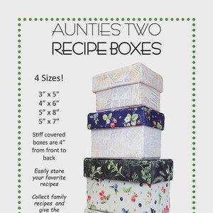 May include: Stack of recipe boxes in various sizes, featuring floral and patterned fabric covers. The boxes are labeled with dimensions like 3" x 5" and 4" x 6". The text on the image says "Aunties Two Recipe Boxes".