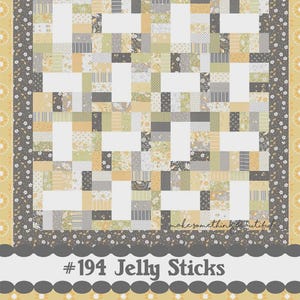 May include: A patchwork quilt with a geometric design, featuring a mix of floral, striped, and solid fabrics in shades of yellow, gray, and white. The quilt is labeled "#194 Jelly Sticks" and "Coriander Quilts by Corey Yoder."