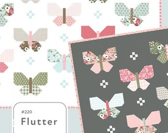 May include: A quilting pattern featuring a butterfly design. The pattern is called "Flutter" and is numbered #220. The pattern is by Jella Boutique, by Vanessa Goertzen. The pattern features a variety of colors and patterns, including pink, green, blue, and brown.