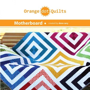 May include: A colorful quilt pattern with a geometric design featuring squares and diamonds. The quilt is made with white fabric and various colors including red, blue, green, yellow, and pink. The quilt is laid out on a wooden bench. The quilt is labeled "Motherboard" and is described as "jelly roll friendly" and "easy" to make. The finished quilt size is 54 inches by 64 inches.
