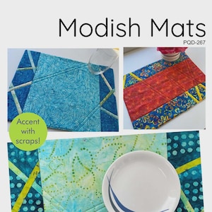 May include: The image showcases colorful, quilted placemats with various patterns and designs. The placemats feature blue, red, and yellow accents, with a white plate on one. The text "Modish Mats" and "Accent with scraps!" are visible.