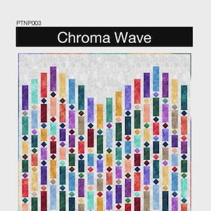 May include: A quilt titled "Chroma Wave" featuring a colorful, abstract design of vertical rectangles in various colors, including red, purple, and green. The rectangles are arranged in a wave-like pattern with small diamond shapes. The quilt is from Pine Tree Country Quilts.