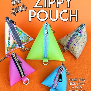 May include: Five triangular zipper pouches in different colors and materials. The pouches are made of clear iridescent plastic, green, pink, blue cork, and brown cork. The pouches have zippers and a metal ring for attaching a key chain. The text "the quick ZIPPY POUCH" is at the top of the image. The text "MAKE THIS SIZE INTO A DOG POOP BAG DISPENSER!" is at the bottom of the image.