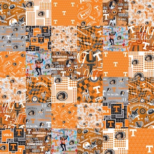 May include: A patchwork design featuring orange, white, and gray squares with various Tennessee Volunteers graphics. The design includes the letter "T", the word "VOLS", and the mascot, Smokey the dog. The overall theme is collegiate.