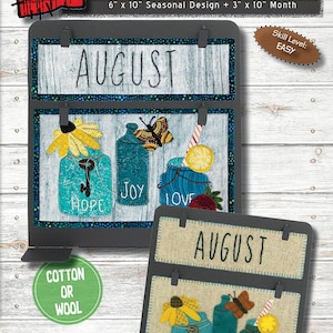 May include: A black metal stand with two 6 x 10 inch and two 3 x 10 inch frames. The frames are decorated with fabric depicting mason jars with flowers, butterflies, and the words "Hope", "Joy", and "Love". The stand is labeled "August" and "MM13 Calendar BOM series".