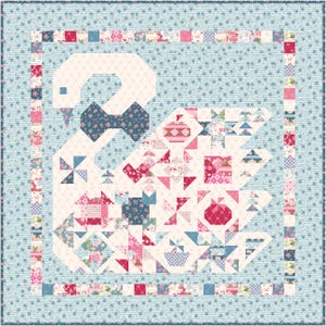 May include: A white swan quilt with a pink, red, and blue floral pattern. The quilt is made up of various patchwork squares and triangles.