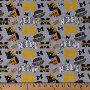 University Of Michigan Wolverines Football Allover On Gray Cotton Fabric Sold By The Half Yard, From Sykel Enterprises NEW