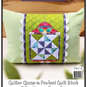 May include: A quilting kit featuring a gnome applique and a pinwheel quilt block. The kit includes instructions, precut fused applique, notions, fabric, and a tea towel for the pillow and wrap. The finished size of the applique is 6 inches by 11 1/2 inches, the pillow is 13 inches by 18 1/2 inches, and the pillow wrap is 8 inches by 30 inches. The kit is titled "Quilter Gnome & Pinwheel Quilt Block Pillow Wrap & Cover Kit" and is by Leanne Anderson 2022.