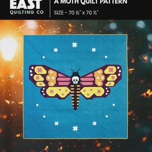 May include: A blue quilt pattern featuring a large moth design with a skull on its head. The moth has yellow, pink, and purple wings. The quilt measures 70.5 inches by 70.5 inches. The text "NIGHT FLUTTER A MOTH QUILT PATTERN" is visible.