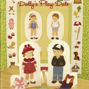 May include: A set of felt doll dress-up figures with interchangeable outfits. The dolls are a boy and a girl, and the outfits include a red dress, a blue shirt, a denim jacket, and a vest. The dolls are standing on a white background with a green border. The text "Dolly's Play Date" is written in red letters at the top of the image.