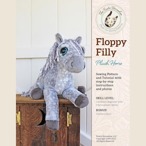 May include: A sewing pattern for a floppy filly plush horse toy. The pattern includes step-by-step instructions and photos. The pattern is for a confident beginner with an intermediate option. The pattern also includes a bonus unicorn horn.