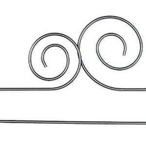May include: A silver metal towel rack with two decorative swirls at the top.