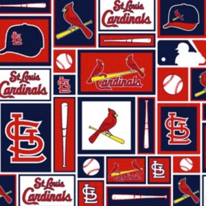 May include: A red, white, and blue fabric with a repeating pattern of baseball bats, baseballs, cardinals, and the St. Louis Cardinals logo. The fabric features the text "St. Louis Cardinals" in a white font.