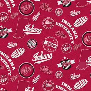 May include: A red background is covered with white text and graphics related to Indiana University. The design includes the word "Indiana" in various fonts, along with the state outline and university logos.