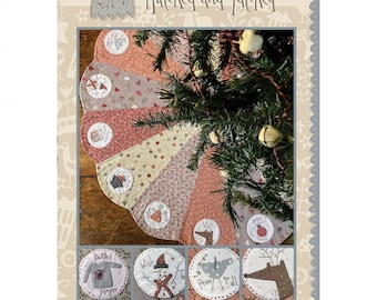 May include: A Christmas tree skirt pattern with a pink, beige, and white color scheme. The pattern features a variety of festive designs, including a knitted jumper, a snowman, a bird, and a reindeer. The pattern is titled "Around for Christmas Tree Skirt".