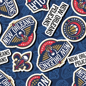 May include: A pattern of New Orleans Pelicans basketball team logos and emblems. The design features the team's name, a pelican, and a basketball, in navy blue, red, gold, and white. The background is a dark blue with a repeating pattern.
