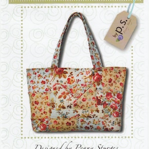 May include: A floral tote bag with a patchwork design. The bag has a brown handle and a white background with pink, red, and yellow flowers. The bag is labeled "ps016 Charm Party Tote" and "Designed by Penny Sturges".